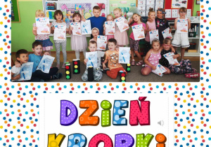 Dzieci pozują do zdjecia z dyplomami
