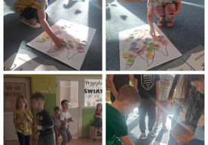 Dzieci przyklejają znalezione w klasie znaczki z dinozaurami na wielki odcisk łapy