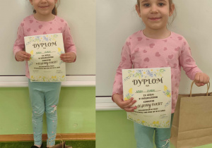 Dziewczynka pozuje do zdjęcia w ręku trzyma dyplom