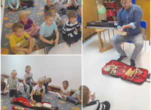 Dzieci poznają instrumenty muzyczne prezentowane przez nauczyciela