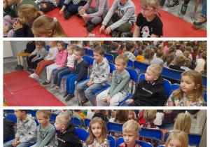 Grupa dzieci siedzi na widowni podczas spektaklu