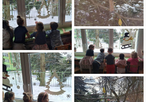 Dzieci obserwują przez okno ogród przedszkolny i ptaki które przyleciały do karmnika