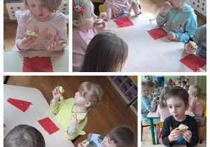 Dzieci siedzą przy stolikach i jedzą babeczki