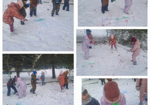 Dzieci malują śnieg wodą zabarwioną kolorowymi farbami