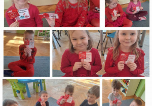 Dzieci ubrane na czerwono prezentują do zdjęcia otrzymane walentynki