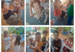 Dzieci łączą w pary połówki motyli i prezentują je do zdjecia