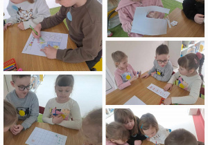 Dzieci wykonują zadania matematyczne w ramach udziału w olimpiadzi